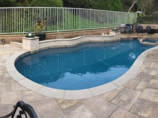 Belgard LaFitt Rustic Slab Montecito Pavers Around A Pool