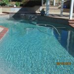 Silver Pearl Sandstone, bluegreen pebble pool, light blue pool water