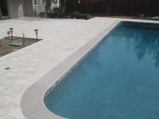 Artistic Pavers with silver pebble pool finish