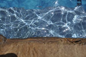 Colored pebble finish for your pool