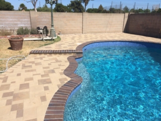 pool with crystal blue radiance brick coping brown flash and orco vill pavers
