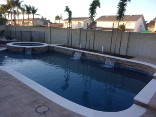 pool spa raised bond beam stack stone water feature sheet flow