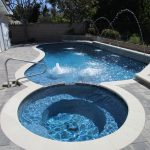 Pool spa white coping pavers handrail waterfeatures