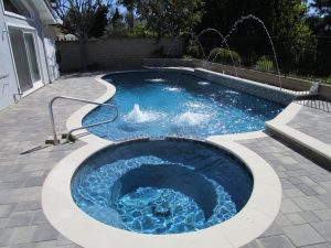 Pool spa white coping pavers handrail waterfeatures