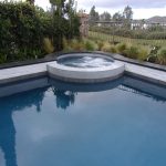 Pool spa with quartz saphire finish raised bond beam