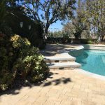 backyard with pool pavers coping radiant fusion pearl