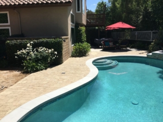 backyard with pool pavers coping radiant fusion pearl