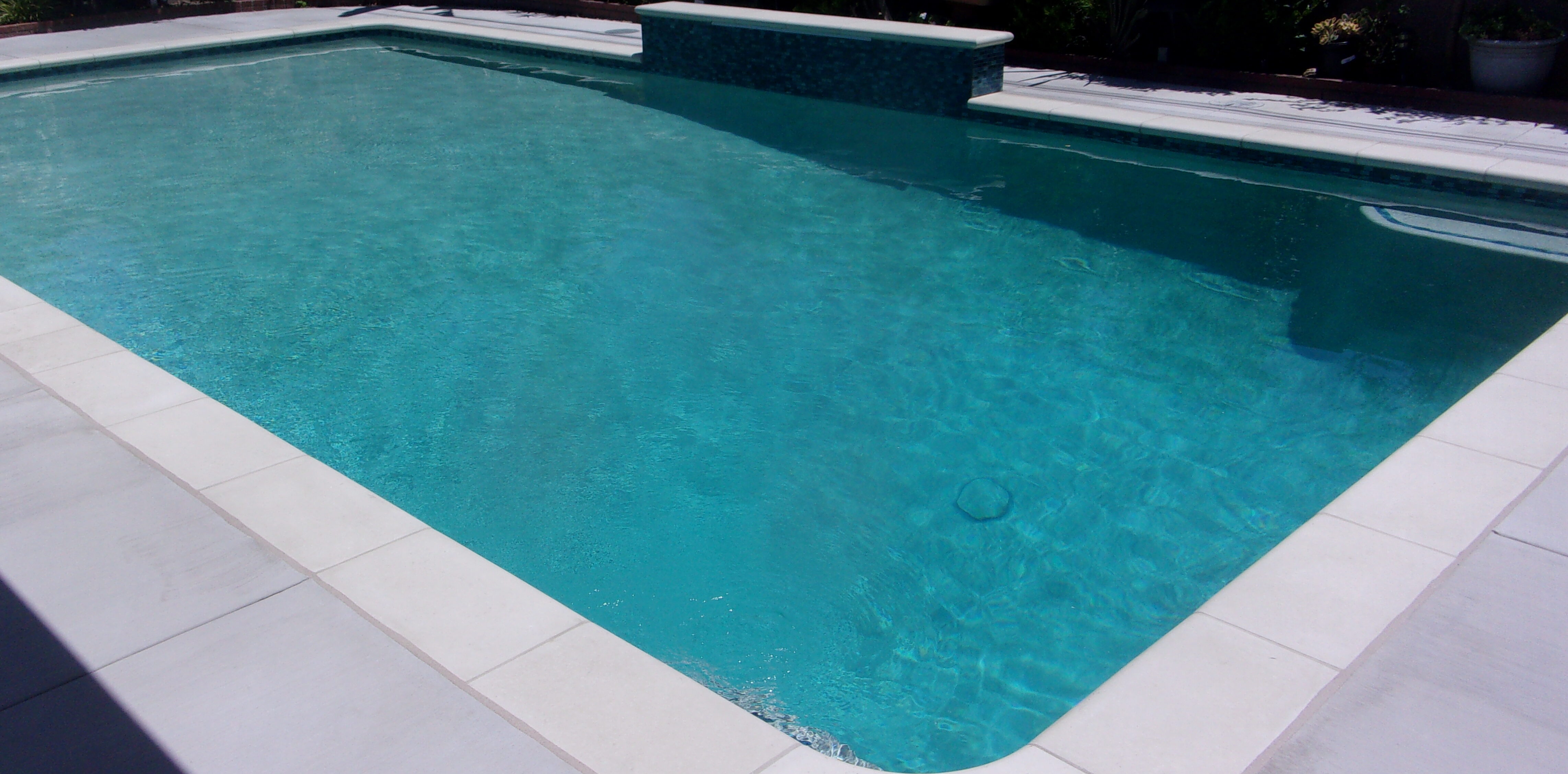 pool waterfeature coping concrete deck