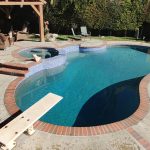 pool raised spa spillway diving board