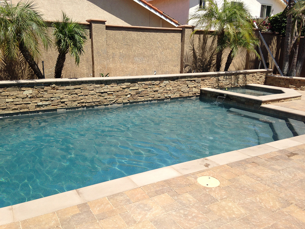 Alan Smith Pool Plastering & Remodeling | Tigers Eye Lagoon with Pebble Radiance Sandstone